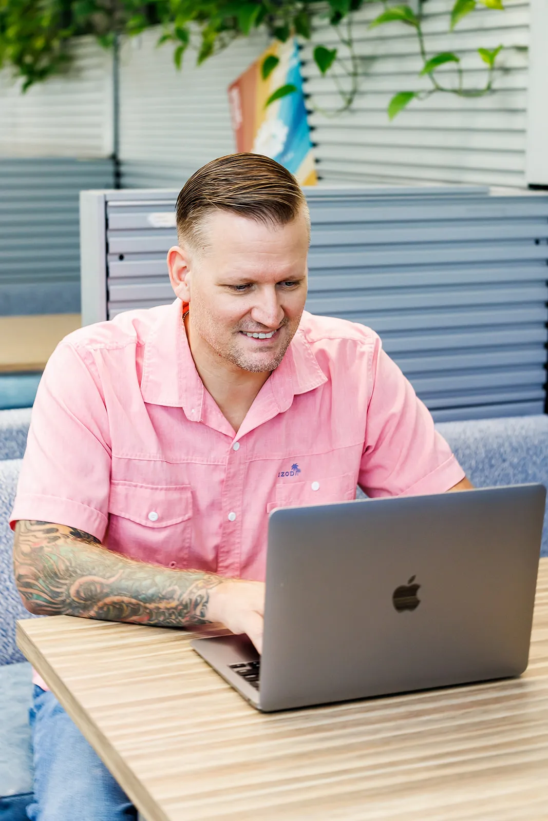 Wesley Cable working on a client marketing strategy on his laptop